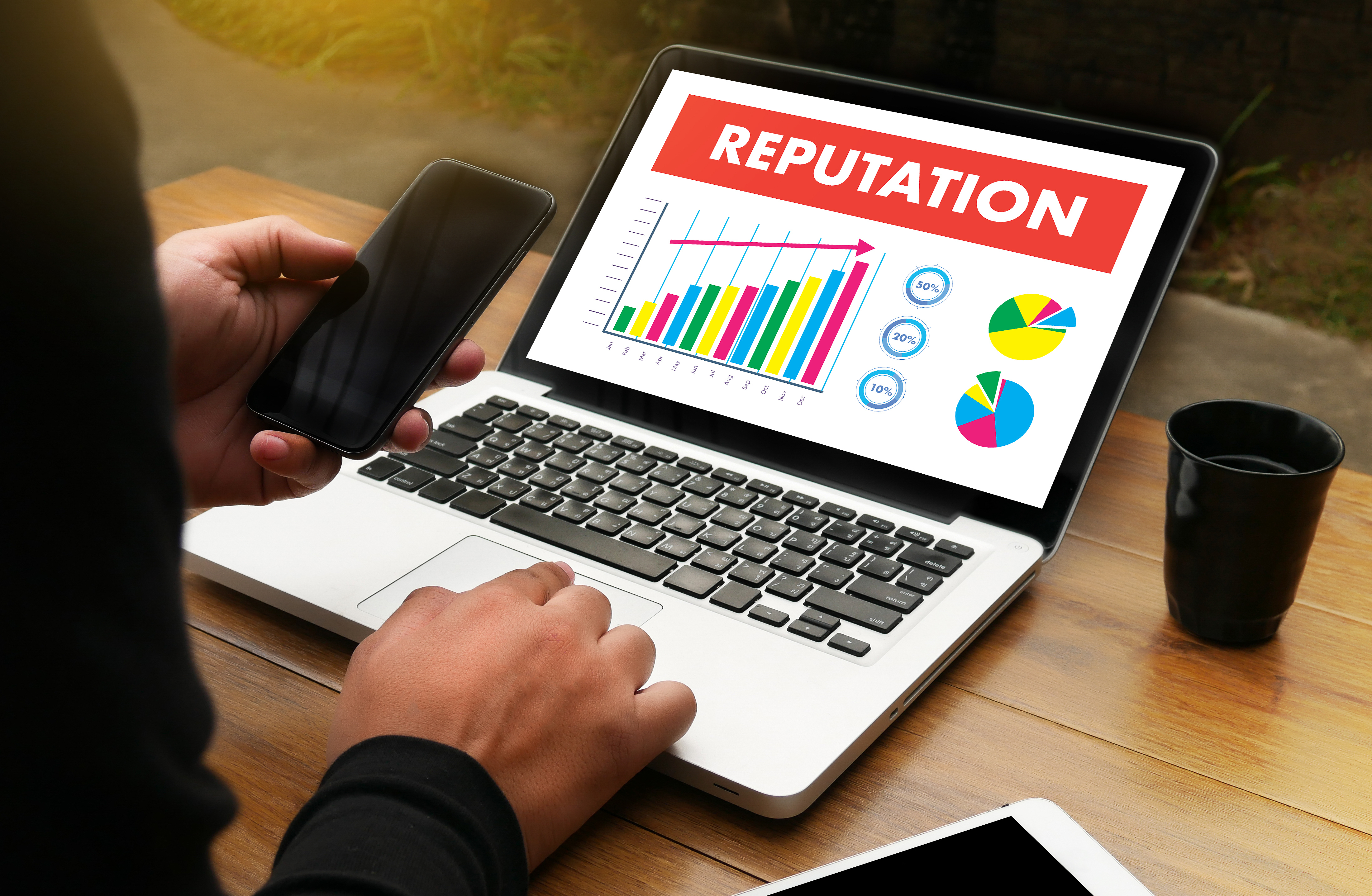 A laptop with a presentation on reputation